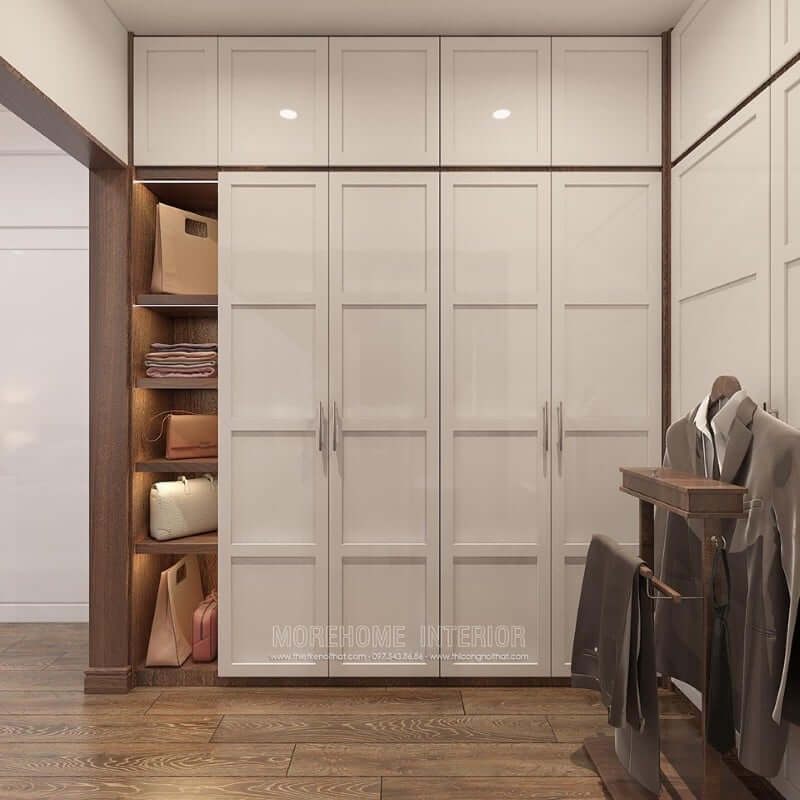 Mẫu tủ quần áo hiện đại đẹp sơn bệt màu trắng với thiết kế âm tườngtthêm ngăn tủ không cánh mang đến vẻ đẹp sang trọng cho không gian căn phòng